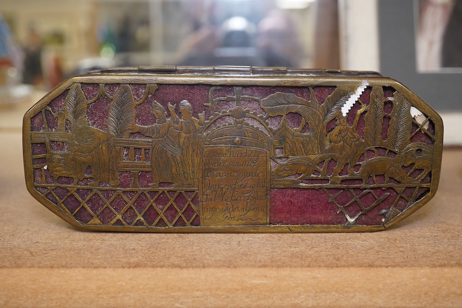 An 18th century Dutch inscribed and reticulated brass tobacco box, 15.5cm in length. Condition - fair